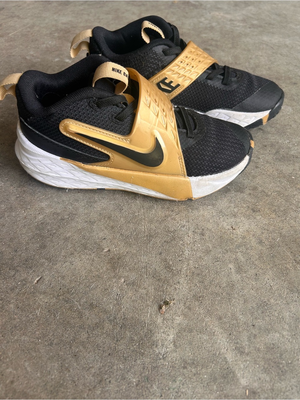 Nike Kids Black and Gold Slip-On Athletic Sneakers